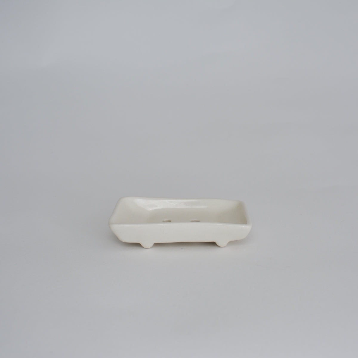 White ceramic dish on a gray background