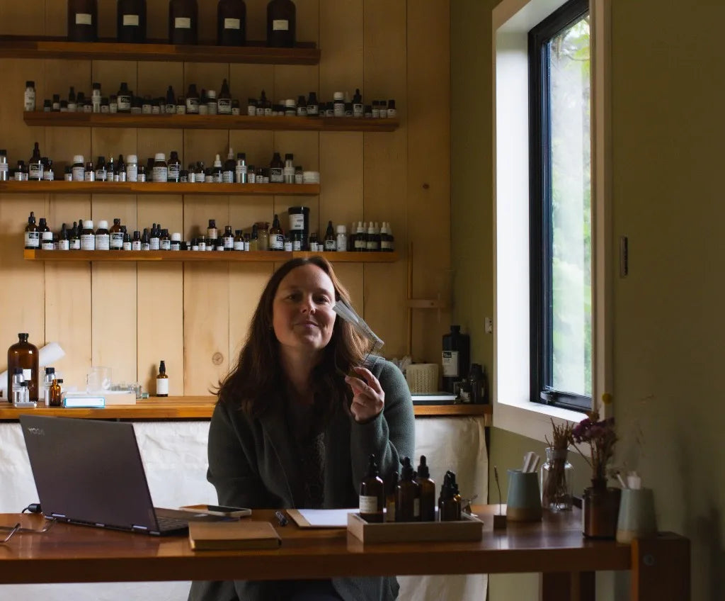Nelly in the Wild Earth perfume studio with scent strips